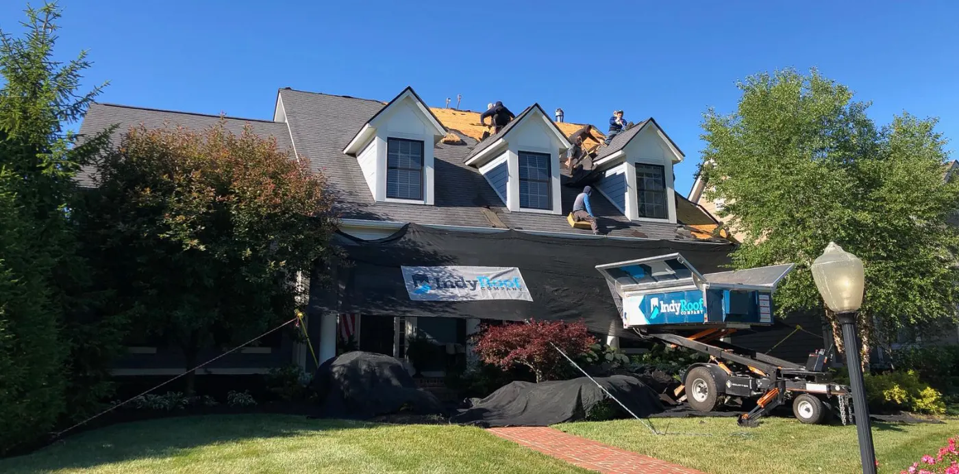 Tarping and dry-in on a Mount Comfort commercial roof